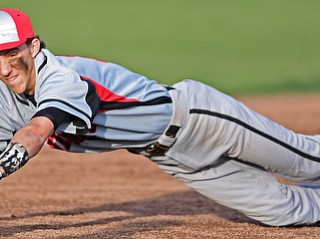 STRUTHERS, OHIO - MARCH 27, 2017: Short stop Stephen Mistovich dives to stop the ball from going into left field in the fourth inning of Monday nights game at Cene Park. DAVID DERMER | THE VINDICATOR