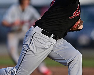 STRUTHERS, OHIO - MARCH 27, 2017: Pitcher Brady Hunkus #9 of Girard delivers int he fourth inning of Monday nights game at Cene Park. DAVID DERMER | THE VINDICATOR