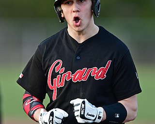 STRUTHERS, OHIO - MARCH 27, 2017: Nick DeGregory #6 of Girard celebrates after a base hit in the sixth inning of Monday nights game at Cene Park. DAVID DERMER | THE VINDICATOR