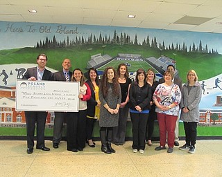 Neighbors | Alexis Bartolomucci.Poland schools were awarded a check for $10,000 in classroom grants that will benefit all five schools in the district on March 6 at Poland Seminary High School.