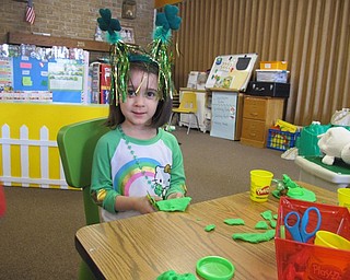 Neighbors | Alexis Bartolomucci.Josey played with green Play-Doh during the St. Patrick's Day Celebration at Hitchcock Woods Early Learning Center on March 16.