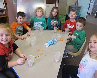 Neighbors | Alexis Bartolomucci.Students at Hitchcock Woods Early Learning Center made rainbow bracelets out of ribbon and cereal for their St. Patrick's Day celebration on March 16.