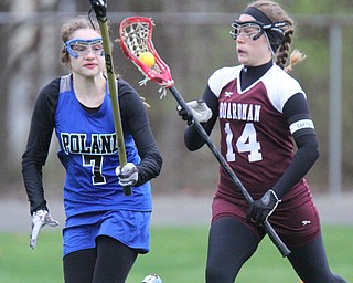William d Lewis the vindicator  Boardman's Kate Bodamer(14) moves the ball around Poland's Sarah Leach(7) during 4-6-17 action at Poland.