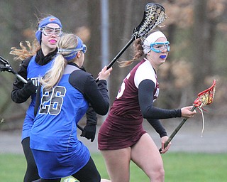 William d Lewis the vindicator  Boardman's Lindsay O'Nesti(15) moves the ball past poland's Kaitlyn Murco(4) and Bailegh black(26)  during 4-6-17 action at Poland
