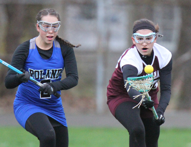 William d Lewis the vindicator Poland's SAllyson Andrews(2) and Boardman's Lilly Essad(23) go for the ball  during 4-6-17 action at Poland