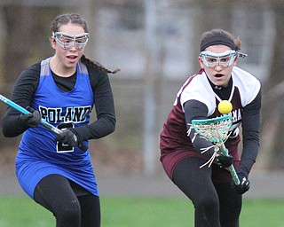 William d Lewis the vindicator Poland's SAllyson Andrews(2) and Boardman's Lilly Essad(23) go for the ball during 4-6-17 action at Poland