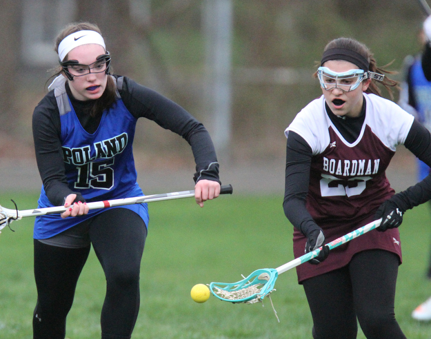 William d Lewis the vindicator Poland's Olivia Barrett(15)  Boardman's Lilly Essad(23)) go for the ball during 4-6-17 action at Poland