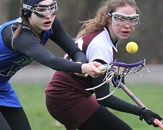 William d Lewis the vindicator Poland's Olivia Barrett(15) and Boardman's Nicole Enright(48) go for the ball during 4-6-17 action at Poland