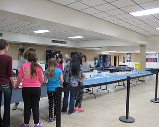 Neighbors | Alexis Bartolomucci.Guests lined up as Austintown PTA members served soup and bread during the annual Souper Supper on March 16 at Austintown Fitch High School.