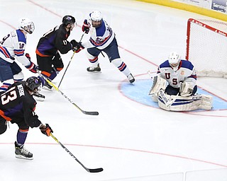 Phantoms forward Nicolas Werbik(13) scores a goal past Team USA goalie Anthony Yamnitsky(60) during the 3rd period as the USA Hockey's National Team takes on the Youngstown Phantoms, Saturday, April 8, 2017 at the Covelli Centre. The Phantoms won 3-0...(Nikos Frazier | The Vindicator)..