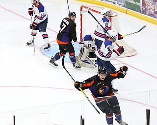 Phantoms forward Nicolas Werbik(13) celebrates a goal past Team USA goalie Anthony Yamnitsky(60) during the 3rd period as the USA Hockey's National Team takes on the Youngstown Phantoms, Saturday, April 8, 2017 at the Covelli Centre. In the back Phantoms forward Pierce Crawford(17) and Team USA defenseman Will MacKinnon(51), Josh Maniscalco(18) and forwardJake Wise(37) look on. The Phantoms won 3-0. ..(Nikos Frazier | The Vindicator)..