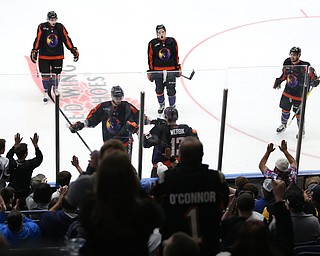 Phantoms players celebrate with forward Nicolas Werbik(13) after scoring a goal during the 3rd period as the USA Hockey's National Team takes on the Youngstown Phantoms, Saturday, April 8, 2017 at the Covelli Centre. The Phantoms won 3-0...(Nikos Frazier | The Vindicator)..