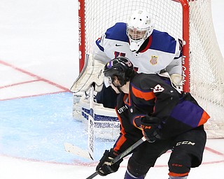 Phantoms forward Alex Esposito(23) tries to put a shot on goal against Team USA goalie Anthony Yamnitsky(60) during the 3rd period as the USA Hockey's National Team takes on the Youngstown Phantoms, Saturday, April 8, 2017 at the Covelli Centre. The Phantoms won 3-0...(Nikos Frazier | The Vindicator)..