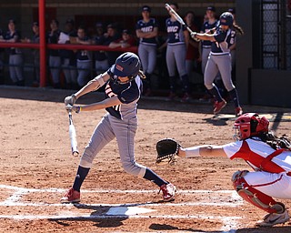 UIC first baseman Taylor Cairns(17) swings at during the 2nd inning as the the UIC Flames  take on the Youngstown Penguins, Saturday, April 8, 2017 at the YSU Softball Field. ..(Nikos Frazier | The Vindicator)..
