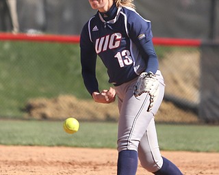 UIC pitcher Elaine Heflin(13) pitches during the 3rd inning as the the UIC Flames  take on the Youngstown Penguins, Saturday, April 8, 2017 at the YSU Softball Field. ..(Nikos Frazier | The Vindicator)..