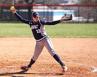 UIC pitcher Elaine Heflin(13) pitches during the 3rd inning as the the UIC Flames  take on the Youngstown Penguins, Saturday, April 8, 2017 at the YSU Softball Field. ..(Nikos Frazier | The Vindicator)..