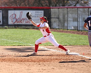 Youngstown State first baseman Kelly Thompson-Cappadocio(7) leans forward for the ball to out UIC infielder Jasmine Willis(14) during the 4th inning as the the UIC Flames  take on the Youngstown Penguins, Saturday, April 8, 2017 at the YSU Softball Field. ..(Nikos Frazier | The Vindicator)..