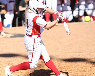 Youngstown State outfielder Sarah Dowd(14) swings during the 4th inning as the the UIC Flames  take on the Youngstown Penguins, Saturday, April 8, 2017 at the YSU Softball Field. ..(Nikos Frazier | The Vindicator)..