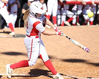 Youngstown State outfielder Sarah Dowd(14) swings during the 4th inning as the the UIC Flames  take on the Youngstown Penguins, Saturday, April 8, 2017 at the YSU Softball Field. ..(Nikos Frazier | The Vindicator)..
