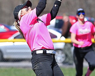 MICHAEL G TAYLOR | THE VINDICATOR- 04-08-17 -  Joanne Kernan Memorial (Irish Strikeout Cancer Softball Tournament) at Candlelite Knolls in Bazetta, OH., Champion Flashes vs West Branch Warriors. 2nd inning, West Branch's 2b #8 Maddie Pidgeon makes diving catch for the 2nd out.