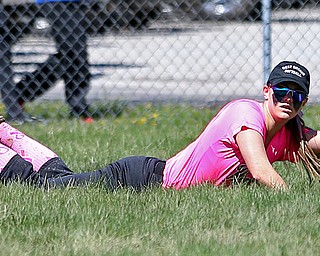 MICHAEL G TAYLOR | THE VINDICATOR- 04-08-17 -  Joanne Kernan Memorial (Irish Strikeout Cancer Softball Tournament) at Candlelite Knolls in Bazetta, OH., Champion Flashes vs West Branch Warriors. 2nd inning, West Branch's RF #24 Jenna Rockwell makes diving catch for the 3rd out.