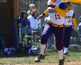 MICHAEL G TAYLOR | THE VINDICATOR- 04-08-17 -  Joanne Kernan Memorial (Irish Strikeout Cancer Softball Tournament) at Candlelite Knolls in Bazetta, OH., Champion Flashes vs West Branch Warriors. 5th inning,  Champion's #13 Abbi Grace sprints home for a run