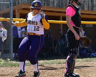MICHAEL G TAYLOR | THE VINDICATOR- 04-08-17 -  Joanne Kernan Memorial (Irish Strikeout Cancer Softball Tournament) at Candlelite Knolls in Bazetta, OH., Champion Flashes vs West Branch Warriors. 5th inning, Champion's #12 Gabby Hollenbaugh youches home for Champion's 3rd run