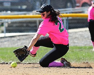 MICHAEL G TAYLOR | THE VINDICATOR- 04-08-17 -  Joanne Kernan Memorial (Irish Strikeout Cancer Softball Tournament) at Candlelite Knolls in Bazetta, OH., Champion Flashes vs West Branch Warriors. 7th inning, West Branch's SS #22 Delaney Rito makes sliding stop and throw for the 3rd out.