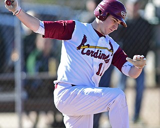 STRUTHERS, OHIO - APRIL 8, 2017: Cardinal Mooney's Chris Lewis (11) strikes out, but will reach first base safely on a wild pitch, in the sixth inning of Saturday afternoons game at Cene Park. St. Ed's won 4-1. DAVID DERMER | THE VINDICATOR