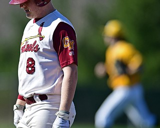STRUTHERS, OHIO - APRIL 8, 2017: Cardinal Mooney's Bryce Richey (8) walks to the dugout after flying out to center to end the game in the seventh inning of Saturday afternoons game at Cene Park. St. Ed's won 4-1. DAVID DERMER | THE VINDICATOR