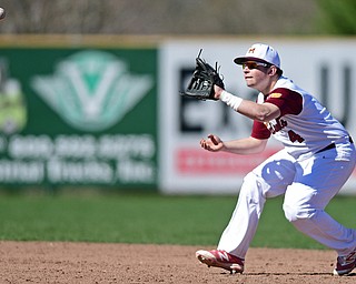 STRUTHERS, OHIO - APRIL 8, 2017: Cardinal Mooney's Gino Guerrieri (4) gets under the ball for the out in the fourth inning of Saturday afternoons game at Cene Park. St. Ed's won 4-1. DAVID DERMER | THE VINDICATOR