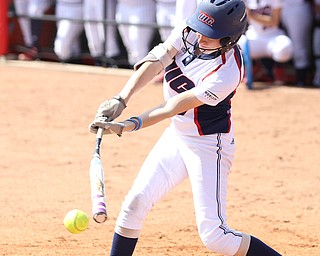 UIC junior infielder Taylor Cairns(17) swings at a pitch from Youngstown State freshman pitcher Maddi Lusk(10) during the 2nd inning as the UIC Flames take on the Youngstown State Penguins, Sunday, April 9, 2017 at the YSU Softball Field. The Flames won 2-1...(Nikos Frazier | The Vindicator)..