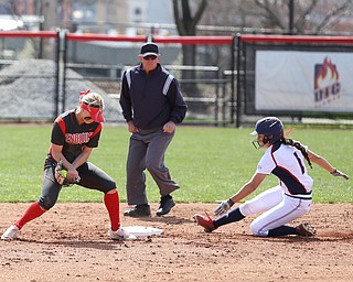 Youngstown State freshman shortstop Tatum Christy(12) struggles to keep the ball in her mitt as UIC sophomore outfielder Lexi Watts(1) slides into second during the 2nd inning as the UIC Flames take on the Youngstown State Penguins, Sunday, April 9, 2017 at the YSU Softball Field. The Flames won 2-1...(Nikos Frazier | The Vindicator)..