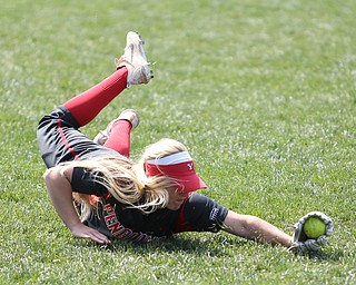 Youngstown State senior outfielder Sarah Dowd(14) dives for the out during the 4th inning as the UIC Flames take on the Youngstown State Penguins, Sunday, April 9, 2017 at the YSU Softball Field. The Flames won 2-1...(Nikos Frazier | The Vindicator)..