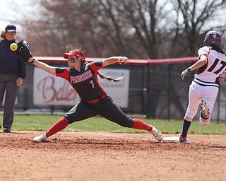 Youngstown State junior first baseman Kelly Thompson-Cappadocio(7) reaches out for the pass as UIC junior infielder Taylor Cairns(17) tags onto first during the 6th inning as the UIC Flames take on the Youngstown State Penguins, Sunday, April 9, 2017 at the YSU Softball Field. The Flames won 2-1...(Nikos Frazier | The Vindicator)..