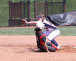 Youngstown State junior outfielder Hannah Lucas(22) slides safely into second as UIC senior infielder Kaleigh Nagle(24) leans out for the pass during the 7th inning as the UIC Flames take on the Youngstown State Penguins, Sunday, April 9, 2017 at the YSU Softball Field. The Flames won 2-1...(Nikos Frazier | The Vindicator)..