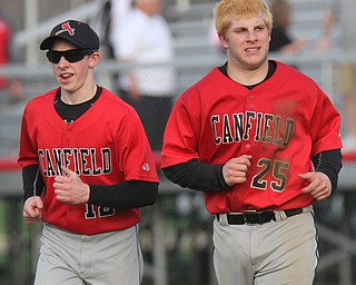 William D. Lewis The Vindicator  Canfield'sRichie Juliano(12) and Angelo Petracci(25) after defeating WGH during 4-10-17 04102017 wdl canfield wgh g.. at Canfield.