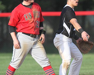 William D. Lewis The Vindicator  Canfield's Mark Whitman(21) is safe at 2nd as WGH's Antonio(2) Walker reacts to the call during 4-10-17 game with WGH at Canfield.