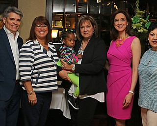 DUSTIN LIVESAY | THE VINDICATOR
The committee for the Angels of Easter Seals 40th annual Spring Fashion Show and Luncheon gathered recently at Springfield Grille in Poland. From left, are Stan Boney of WKBN-TV 27; Shelly LaBerto, president of Angels of Easter Seals; Aubrii Graves, 4, child ambassador of Youngstown; Joyce Dowell, co-chairman of the event; Leslie Barrett of WFMJ-TV 21; and Judy Conti, fashion coordinator.