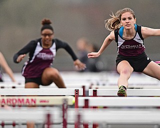 BOARDMAN, OHIO - APRIL 11, 2017: Jessica Knickerbocker of Boardman clears a hurdle while racing to the finish line during her head of the girls 100 meter hurdles, Tuesday afternoon at Spartan Stadium. DAVID DERMER | THE VINDICATOR
