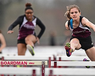 BOARDMAN, OHIO - APRIL 11, 2017: Jessica Knickerbocker of Boardman clears a hurdle while racing to the finish line during her head of the girls 100 meter hurdles, Tuesday afternoon at Spartan Stadium. DAVID DERMER | THE VINDICATOR