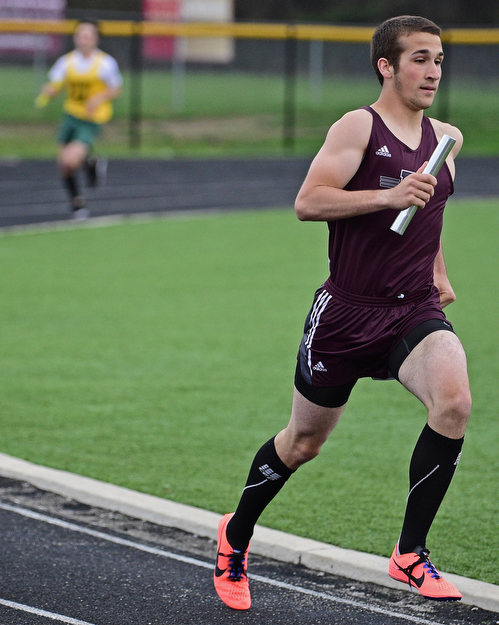 BOARDMAN, OHIO - APRIL 11, 2017: Nick DiGiacomo of Boardman runs don the back stretch during the 4x800 meter relay, Tuesday afternoon at Spartan Stadium. DAVID DERMER | THE VINDICATOR