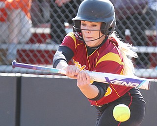 William D Lewis The Vindicator Mooney's (15) bunts during 4-12-17 game with Ursuline.
