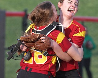 William D Lewis The Vindicator   Mooney pitcher(21), right and catcher react on the mound after Mooney defeated Ursuline 9-7 in 9 innings 4-12-17 at YSU.