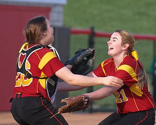 William D Lewis The Vindicator   Mooney pitcher(21), right and catcher react on the mound after Mooney defeated Ursuline 9-7 in 9 innings 4-12-17 at YSU.