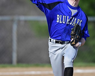 McDONALD, OHIO - APRIL 12, 2017: Jackson-Milton third basemen Eric Ostrowski (7) throws to first for the out in the second inning of Wednesday evenings game at Woodland Park. Jackson-Milton won 3-2. DAVID DERMER | THE VINDICATOR