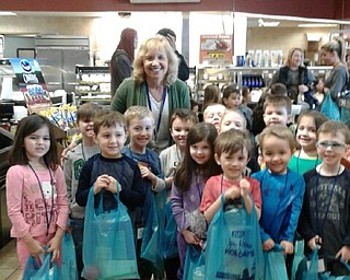 Neighbors | Submitted.Joy Bucci and her class took back goodie bags they received during their tour of the Poland Giant Eagle.