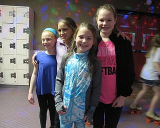 Neighbors | Alexis Bartolomucci.Students celebrated reaching their Read-a-Thon goal by going skating at Youngstown Skate on March 13.