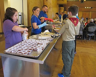 Neighbors | Alexis Bartolomucci.Volunteers and Boardman Rotarians prepared the plates for the guests at the annual Pancake Breakfast at Boardman Park.