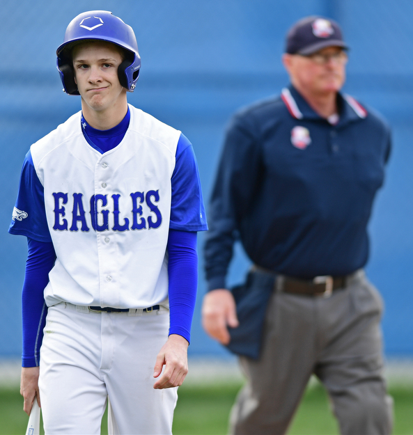 HUBBARD, OHIO - APRIL 13, 2017: Hubbard's Jamie Thomson (15) shows his frustration after striking out looking to end the third inning of Thursday evenings game at Hubbard High School. DAVID DERMER | THE VINDICATOR